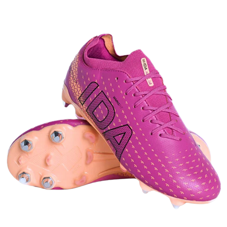 The IDA Helia Club SG - Dark Pink by IDA Sports is a women’s soft ground soccer cleat with laces and metal studs, designed for traction on wet, muddy fields—ideal for beginner to intermediate female players.