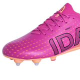 The IDA Sports IDA Helia Club SG women's soccer cleat in dark pink features black lettering, orange studs, and a lace-up design, shown on a white background.