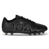 IDA Sports' "Stronger Together" black soccer cleat, Ida Women's Rise Club FG, features a textured vegan leather design with firm ground studs and prominently displays "IDA" on the side for an adjustable fit.