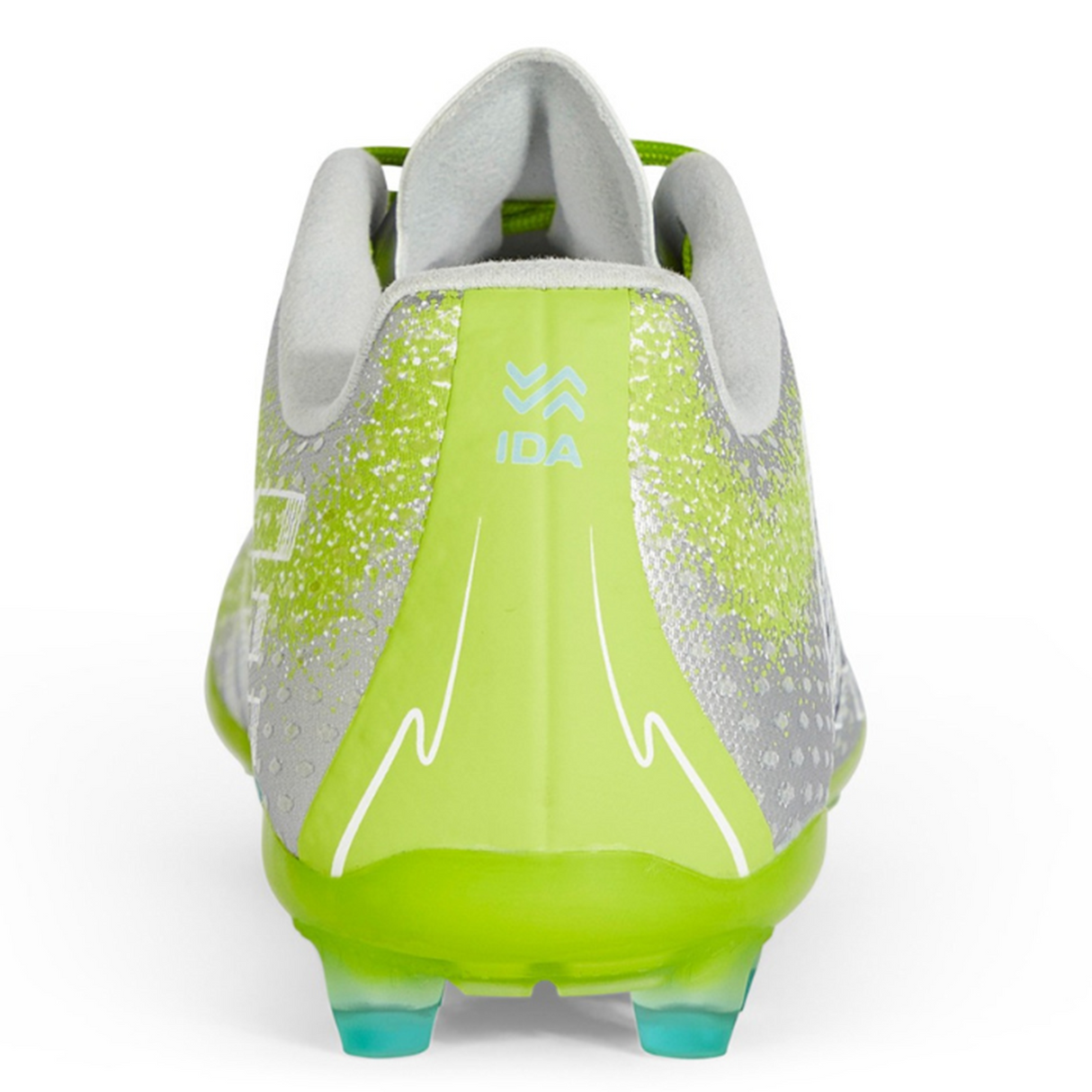 The Ida Women's Rise Club FG "Play All Day" by IDA Sports is made with vegan leather in silver and green. It has a rear view design, adjustable fit, textured pattern, and the word "IDA" on the back. Designed for firm ground play.