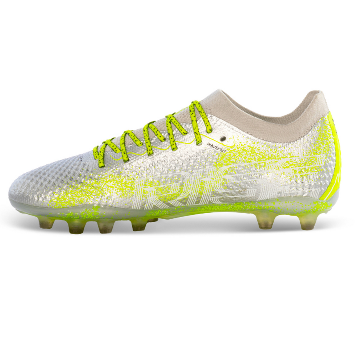The IDA Sports Ida Women's Rise Elite FG "Play All Day" cleat in silver/green boasts textured patterns and laces, vegan materials, and a multi-studded sole for enhanced field grip.