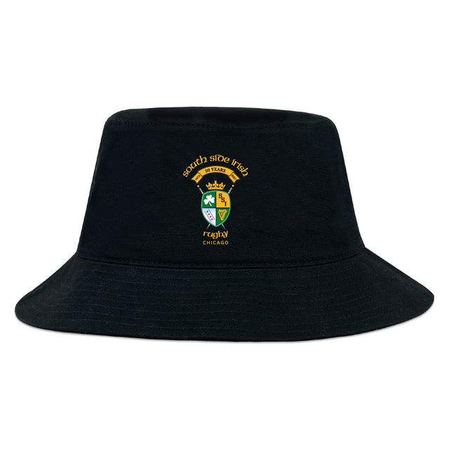 The EMB S&S Activewear South Side Irish 50th Anniversary Crusher Bucket Cap is a black cotton twill hat with an embroidered shield and crown Chicago logo, offering stylish sun protection.