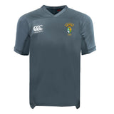 The South Side Irish 50th Anniversary Vapodri Evader Jersey by EMB Canterbury is a grey short-sleeve rugby top with moisture-wicking fabric, a Canterbury logo on the right chest, and a green and yellow badge on the left.