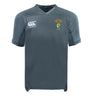 The South Side Irish 50th Anniversary Vapodri Evader Jersey by EMB Canterbury is a grey short-sleeve rugby top with moisture-wicking fabric, a Canterbury logo on the right chest, and a green and yellow badge on the left.