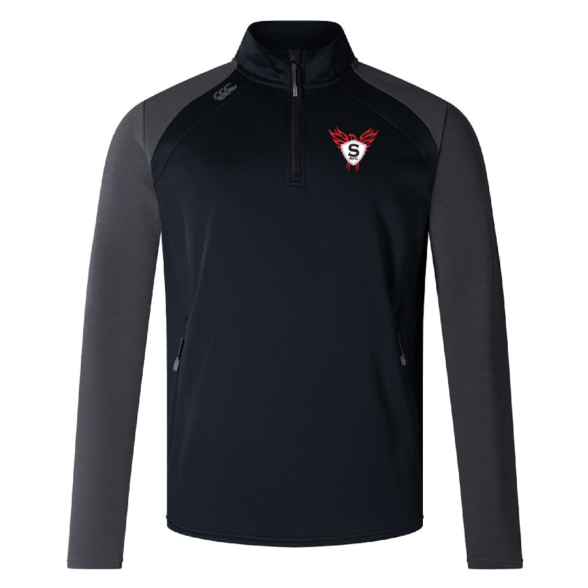 The Superior Rugby Elite 1/4 Zip Top by EMB Canterbury features black and dark gray colors, a red and white winged "S" logo on the chest, zippered side pockets, and is crafted from lower impact materials for comfort and performance.
