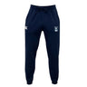 The EMB Canterbury Eckerd College Leisure Sweatpant features navy blue sustainable fleece, a drawstring waist, two logos on the upper legs, and tapered legs.
