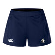 The Five Star Rugby Women's Advantage Short 2.0 by EMB Canterbury features a navy blue design, elastic waistband, side pockets, and white leg logos—crafted from recycled materials for sustainable sportswear you’ll love.