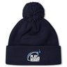 Stay warm on game days with the Play Rugby USA Pom Pom Beanie by EMB Canterbury, featuring a navy blue design, cozy fleece lining, and a white-and-blue "Play Rugby USA" logo on the cuff.