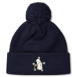 The Five Star Rugby Pom Pom Beanie by EMB Canterbury is a navy blue knit hat with a pom-pom, featuring an embroidered glove holding a candy cane surrounded by stars on the front fold.