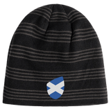 A Scotland Shield Beanie by EMB Canterbury in black and gray stripes, featuring a shield patch on the front.