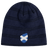 The EMB Canterbury Scotland Shield Beanie is a navy blue knit hat featuring horizontal stripes and a small blue and white shield emblem with the Scottish flag.