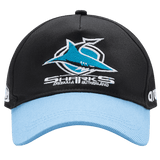 The Sharks NRL 25/26 Media Cap by Classic Sportswear is black and light blue, featuring the iconic shark logo and "Sharks Cronulla Sutherland" text. A must-have for fans, it showcases team spirit with quality craftsmanship.