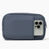 The SLB Original Side Line Bag is a small, rectangular grey waterproof neoprene organizer with a front pocket holding a silver smartphone—ideal as a stylish side line bag for female athletes.
