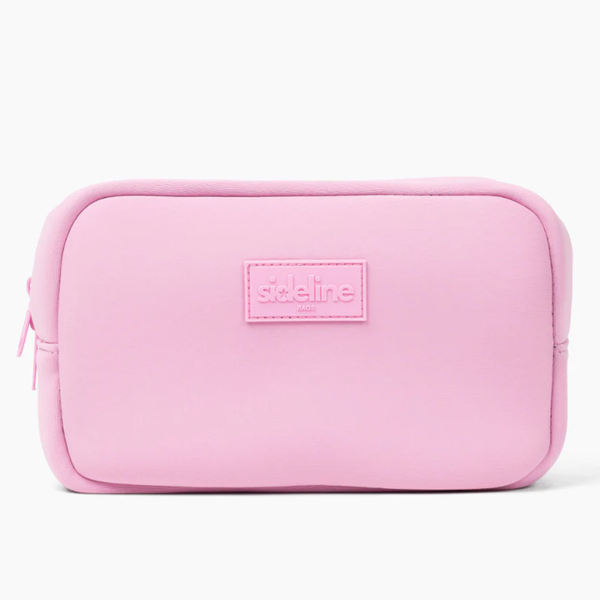 The Original Side Line Bag by SLB is a rectangular light pink waterproof neoprene zippered organizer featuring a stitched "sideline NYC" label on the front, designed for female athletes.