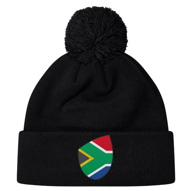 The South Africa Shield Pom Pom Beanie by EMB Canterbury is a stylish black beanie with a front cuff patch showcasing the iconic South Africa shield, combining style and pride in one cozy accessory.