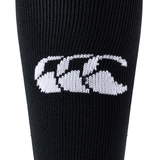 Close-up of black fabric with a white, three-part, stylized logo resembling three intertwined letters "C," embroidered in the center. The intricate design showcases the craftsmanship often found in the Canterbury Playing Sock by Canterbury, highlighting attention to detail.