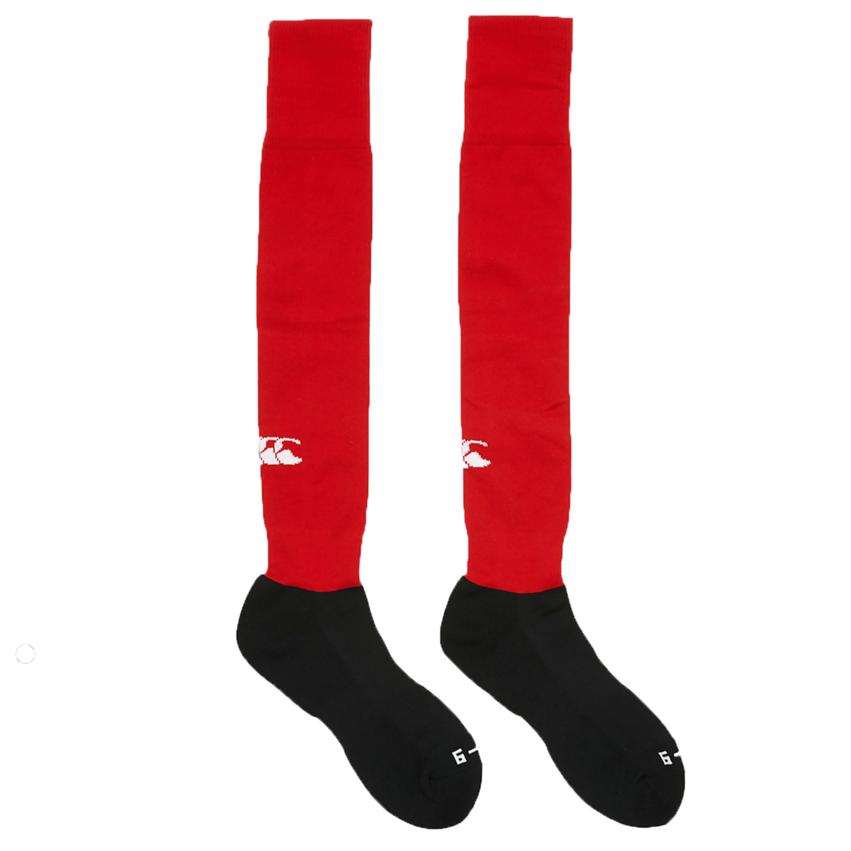 A pair of Canterbury Playing Socks from Canterbury, available in red and black, featuring a white logo near the knee and a cushioned footbed for extra comfort.