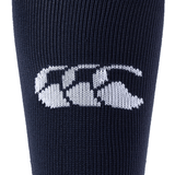 Close-up of a navy blue knit fabric featuring a white Canterbury logo with three overlapping shapes resembling sideways Cs, reminiscent of the design found on premium Canterbury Playing Sock.