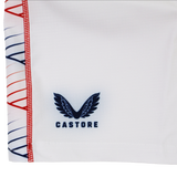 Close-up of the Women's USA Rugby 22/23 RWC Home Pro Short by Castore, showing white fabric with the Castore logo in navy blue and decorative red and blue stitching along the edge.
