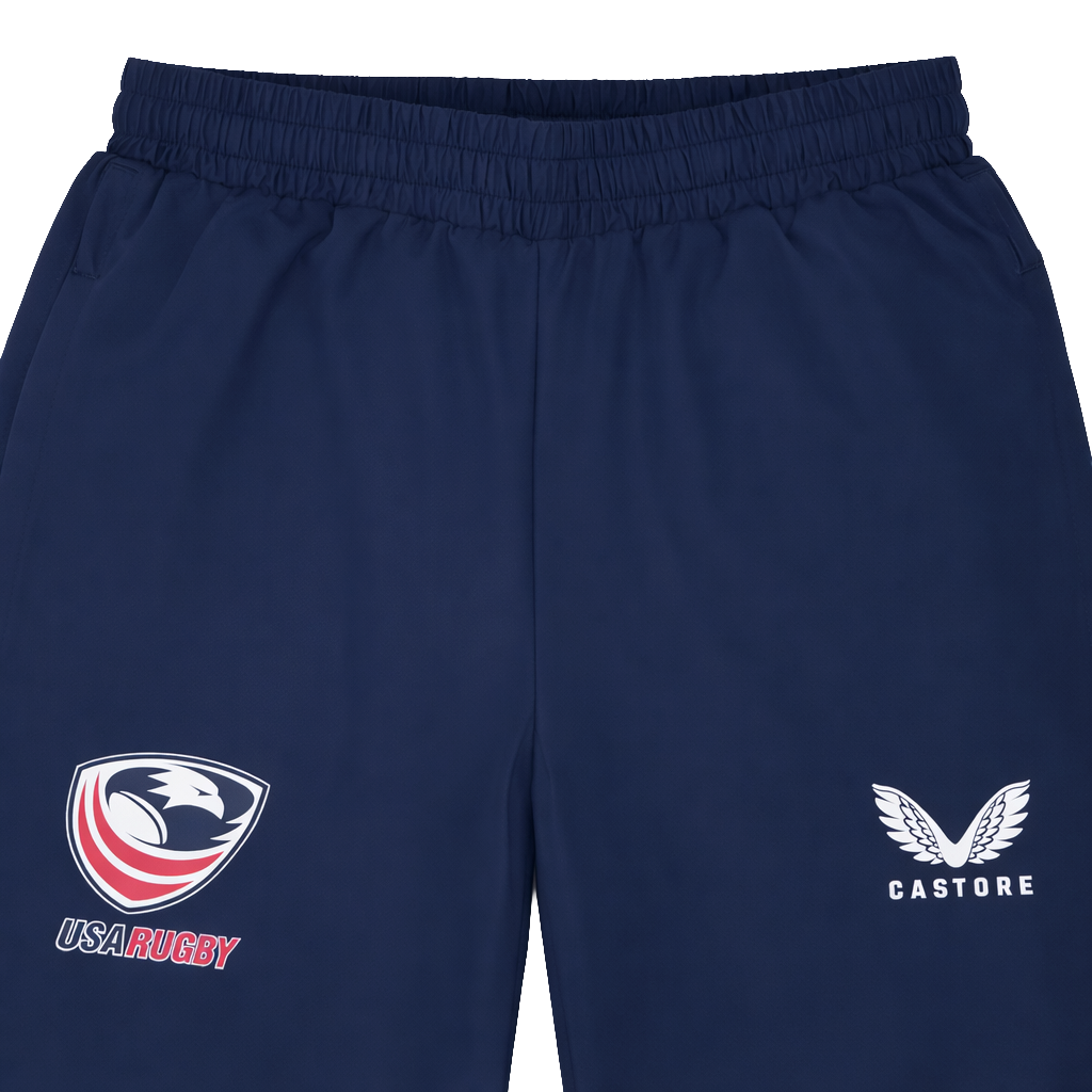 The Womens USA Rugby Weather-resistant Pant by Castore features the USA Rugby logo on the left and the Castore logo on the right—ideal for fans of Castore women's rugby.