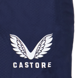 Close-up of weather-resistant navy womens USA Rugby pants by Castore, featuring a white winged logo and "CASTORE" print.