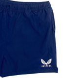 These blue women's rugby shorts by Castore, part of the USA Rugby line, feature an elastic waistband, white logo of wings with "Castore" on the lower left side, seamlessly blending comfort and style.