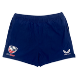 The Women's USA Rugby Zippered Shorts by Castore in navy blue feature the "USA Rugby" logo on the left and a sleek "Castore" logo on the right, ideal for sporty active wear.
