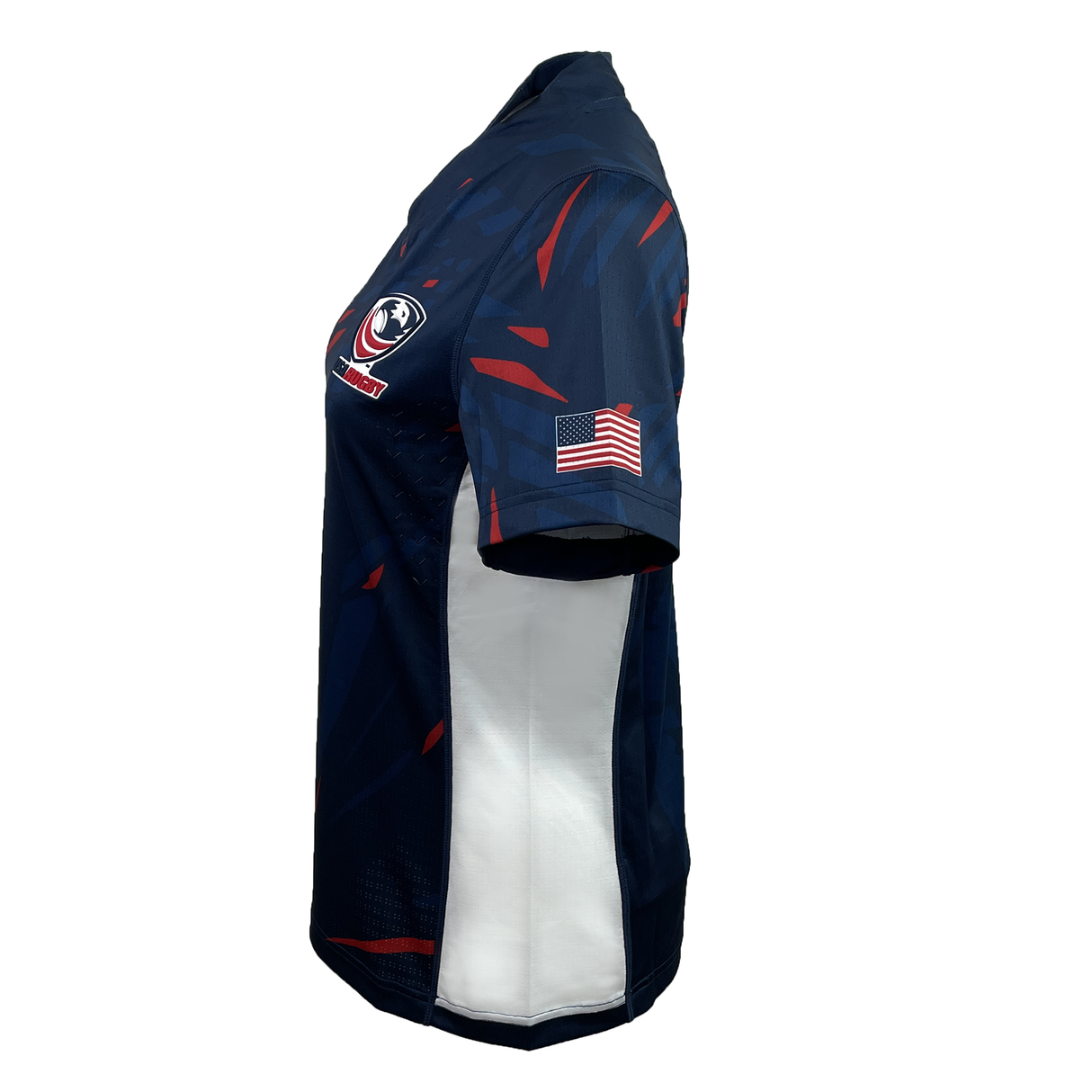 Side view of a dark blue Women's USA Rugby Authentic Home Jersey by Castore. It features a chest logo, American flag sleeve patch, and white/red accents. This athletic fit ensures comfort with moisture-wicking fabric for intense matches.