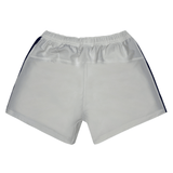 The Women's USA Rugby Pro Away Shorts by Castore showcase navy side stripes on a white design. Perfect for athletes seeking quality, these shorts blend performance and style for every game.