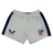 The Women's USA Rugby Pro Away Shorts by Castore are white with navy side panels, featuring the Castore logo on the left and the USA Rugby emblem on the right. Perfect for any enthusiast.