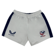 The Women's USA Rugby 23/24 Pro Away Shorts by Castore feature white fabric, navy side panels, and both the USA Rugby emblem and Castore logo—ideal for pro away games.