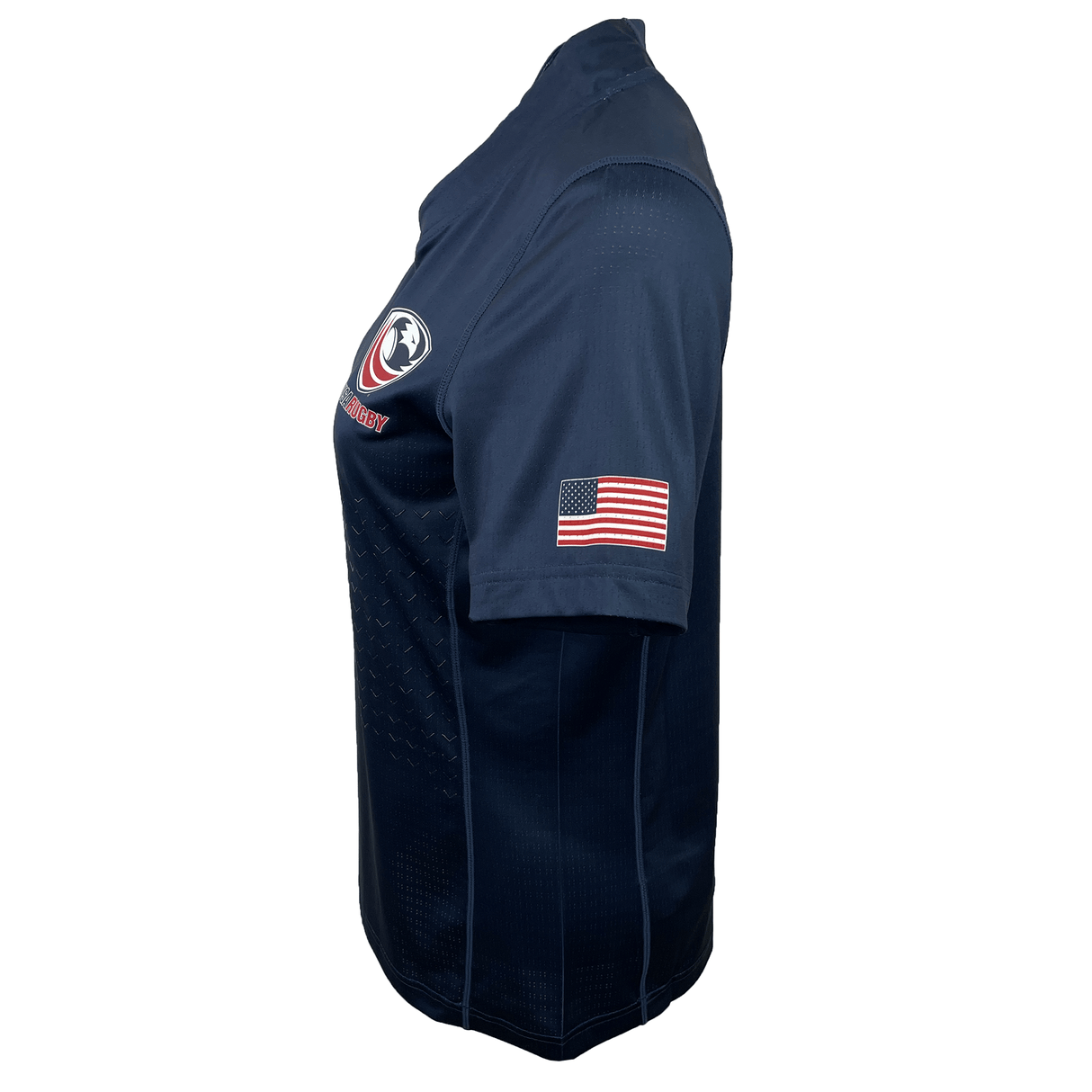 Side view of Castore's Women's USA Rugby Training Jersey in navy blue, made from moisture-wicking fabric. It showcases an American flag patch on the sleeve and a circular logo on the chest.