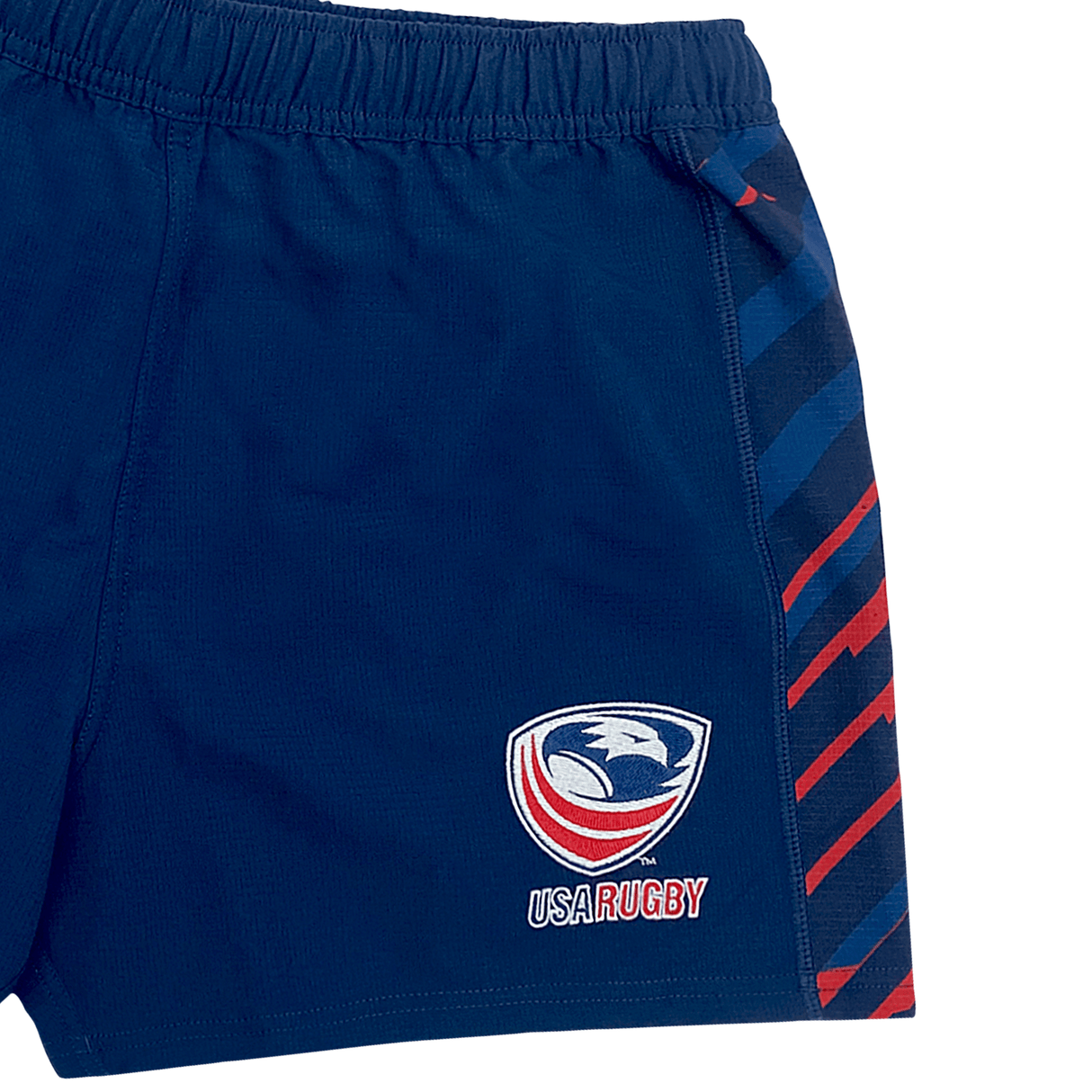 Women's USA Rugby Pro Home Shorts by Castore feature the USA Rugby logo with red-striped accents on the right side, crafted from moisture-wicking fabric and an elasticated waistband for top-level comfort and performance.