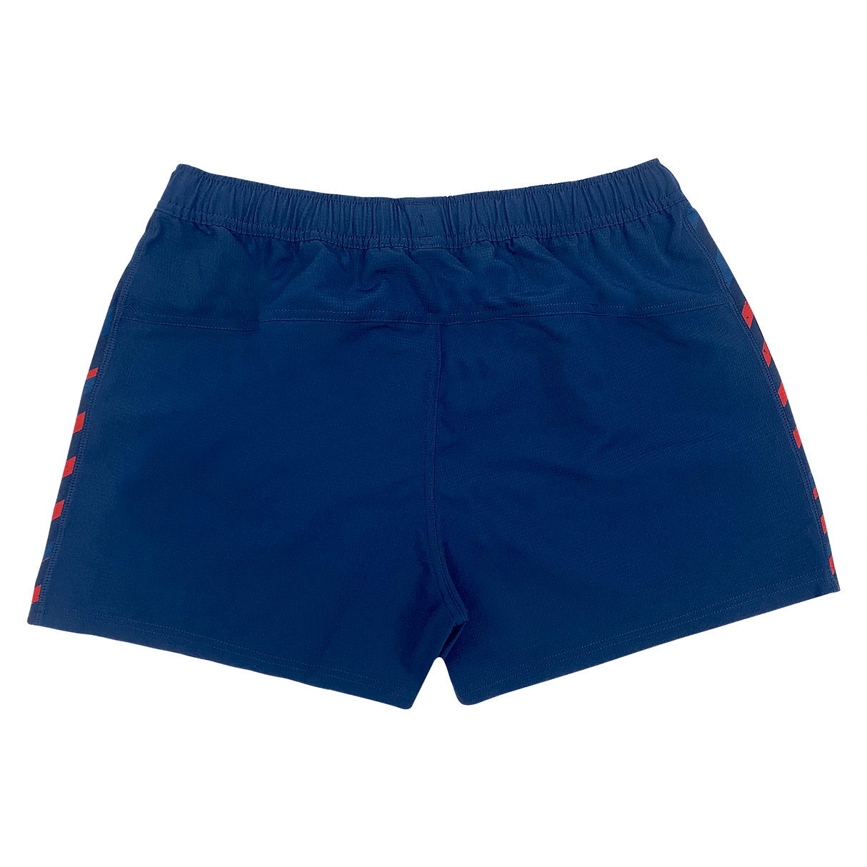 The Women's USA Rugby Pro Home Shorts by Castore showcase a back view with an elastic waistband and red checkered side stripes, crafted with moisture-wicking fabric for ultimate comfort.