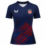The Women's USA Rugby 24/25 7s Olympic Pro Home Jersey by Castore features navy blue fabric with red diagonal stripes, a Castore logo on the right chest, and a USA shield badge on the left chest.