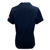 A navy blue short-sleeve jersey by Castore, crafted from performance fabric and showcasing an American flag patch on the left sleeve, is shown from the back. This item is part of the Women's USA Rugby 2024 Olympic 7's collection.