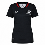 The Women's Saracens Home Replica Jersey 24/25 by Castore features a black design with subtle checks, red collar accents, and white Castore and Saracens logos—ideal for rugby fans.