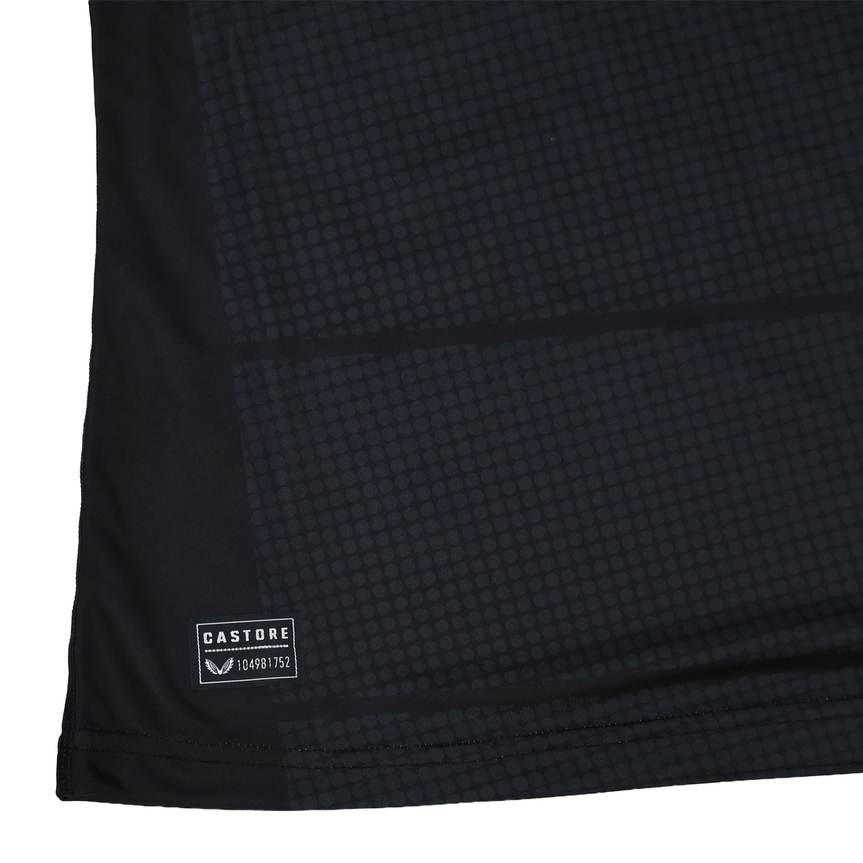 Close-up of the Women's Saracens Home Replica Jersey 24/25 by Castore, in black with a subtle square dot pattern and a small Castore label near the bottom hem.