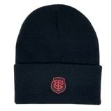 A black Stade Toulousain Cuffed Beanie by Nike with a folded brim, featuring a red embroidered TS crest on the front.