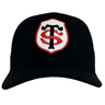 Front view of a black Stade Toulousain Classic 99 Trucker Cap by Nike featuring an embroidered ST crest with intertwined "S" and "T" letters in white and red, bordered by a red and white shield design.