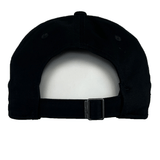 The image shows the back view of a black and pink adjustable hat. The adjustable strap with a metal buckle, typical of the Stade Toulousain Heritage 86 Cap by Nike, is in the center.