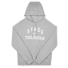 The Stade Toulousain 25/26 Premium Pullover Hoodie by Nike is a light gray hoodie with "STADE TOULOUSAIN" in white on the front and a drawstring hood for comfort.