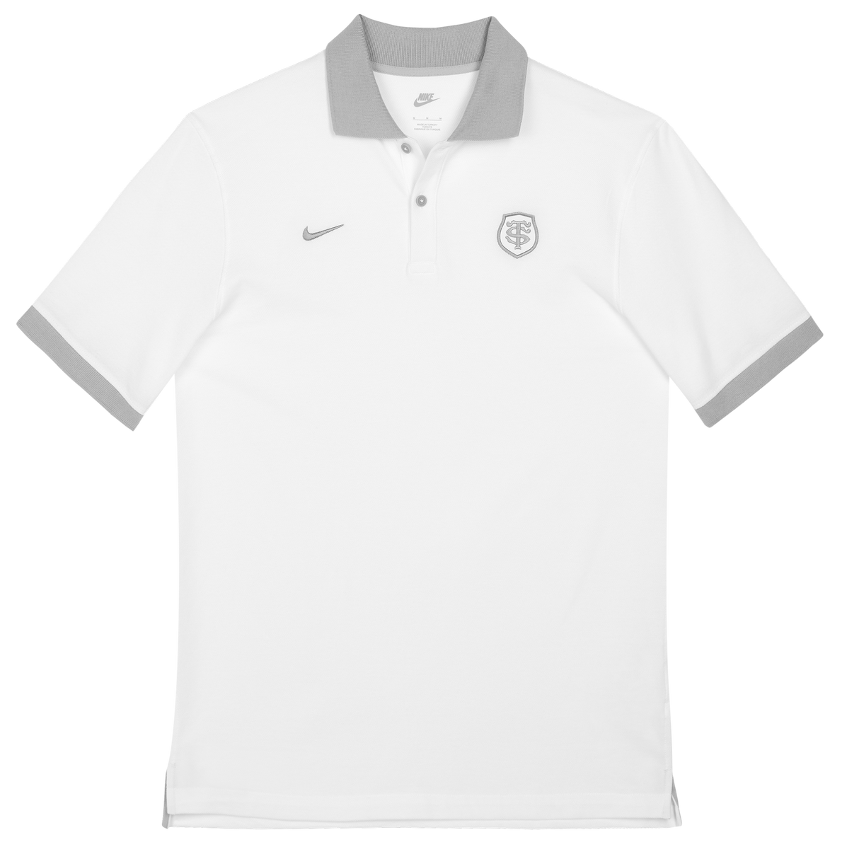 The Nike Stade Toulousain 25/26 Premium Pique Polo is a white short-sleeve shirt with a grey collar and sleeve trim, featuring a small grey Nike logo and the Stade Toulousain crest on the left chest.