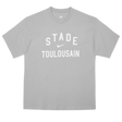 The Nike Stade Toulousain 25/26 Premium Loose-Fit T-Shirt is a grey cotton tee with "STADE TOULOUSAIN" boldly printed in white on the front.