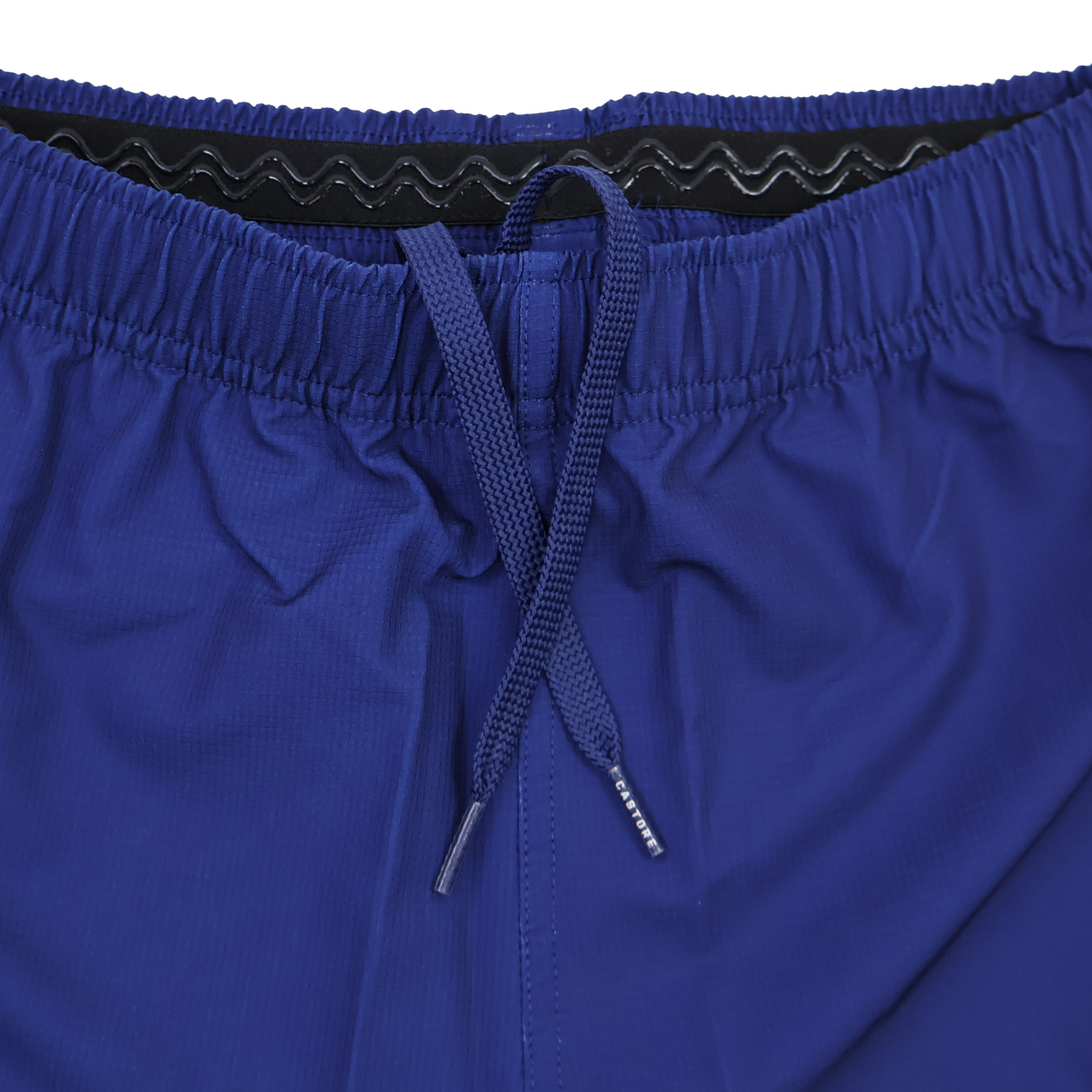 Close-up of the waistband and drawstring on the Leinster 25/26 Home Pro Short by Castore, featuring a royal blue ripstop fabric, elastic band, and black silicone grip inside.