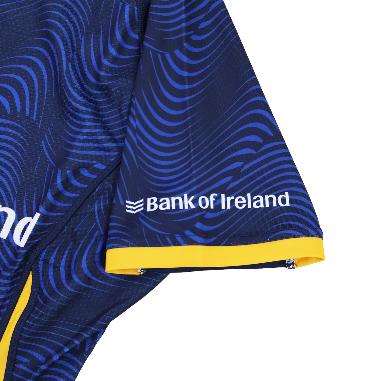 Close-up of the Leinster 25/26 Third Pro Shirt by Castore: dark blue sleeve with wavy light blue patterns, yellow trim, and white "Bank of Ireland" logo—engineered by Castore for top rugby performance.