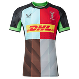 The Harlequins Pro Home Jersey 23/24 by Castore is a multi-colored rugby jersey featuring DHL, Castore, and club logos on the front.