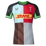 The Harlequins Pro Home Jersey 23/24 by Castore is a multi-colored rugby jersey featuring DHL, Castore, and club logos on the front.