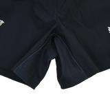 Close-up of the crotch area on the black Harlequins 22/23 3rd Pro Short by Castore, showing visible seams and small embroidered logos on each leg.