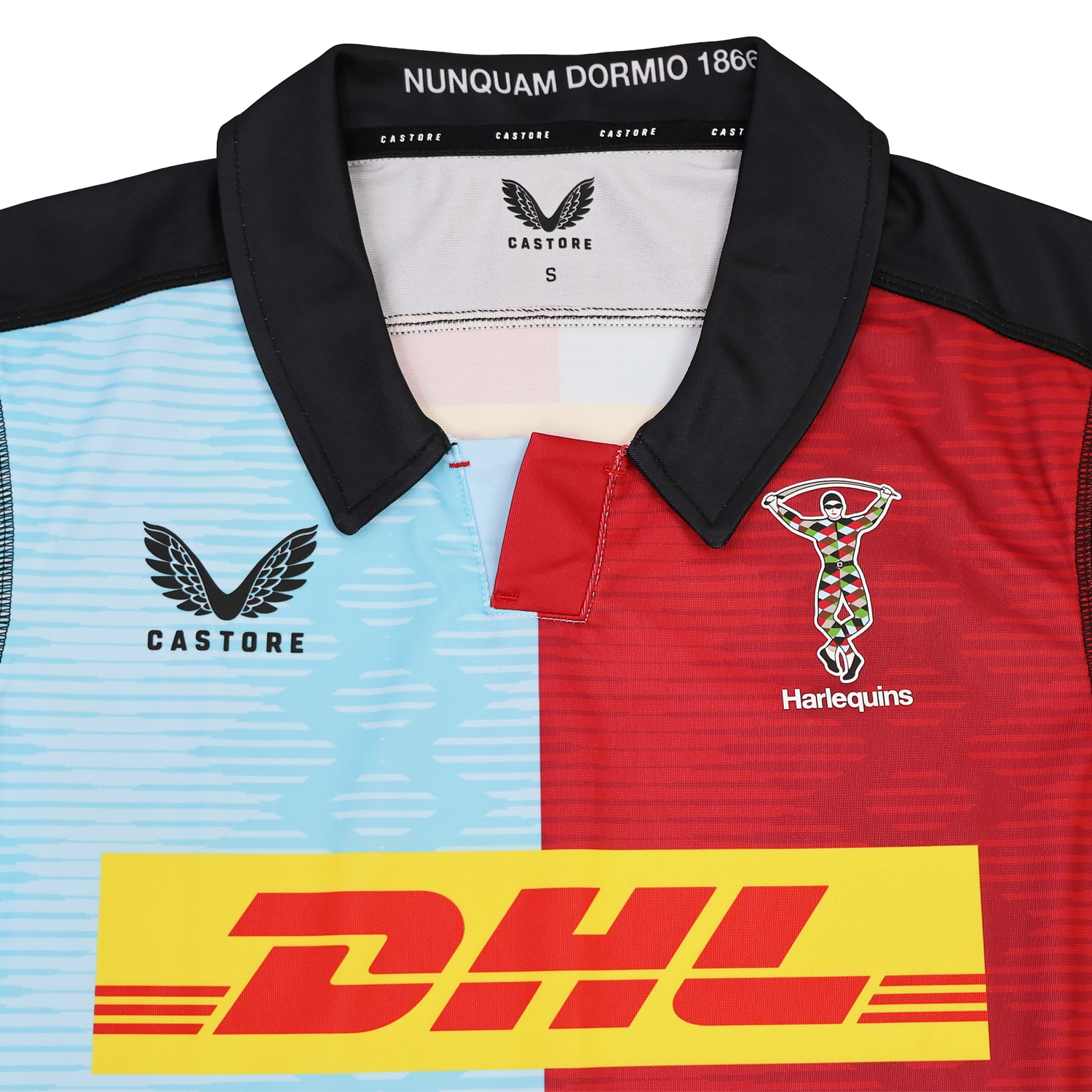 The Harlequins Replica Home Jersey 22/23 by Castore features blue and red panels, DHL sponsor logo, club crest, and a collar with "NUNQUAM DORMIO 1866"—a must-have for passionate fans.